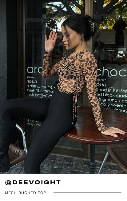 a female Mr Price influencer in a lace leopard mesh ruched top