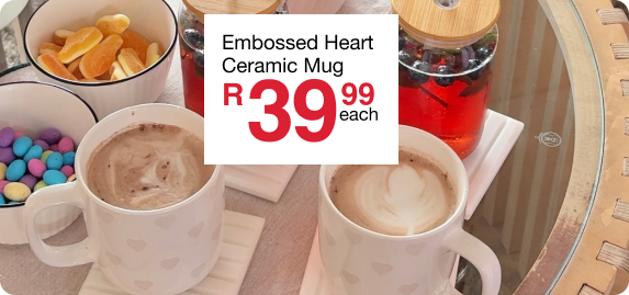 womas day embossed heart ceramic mug. shop womans day