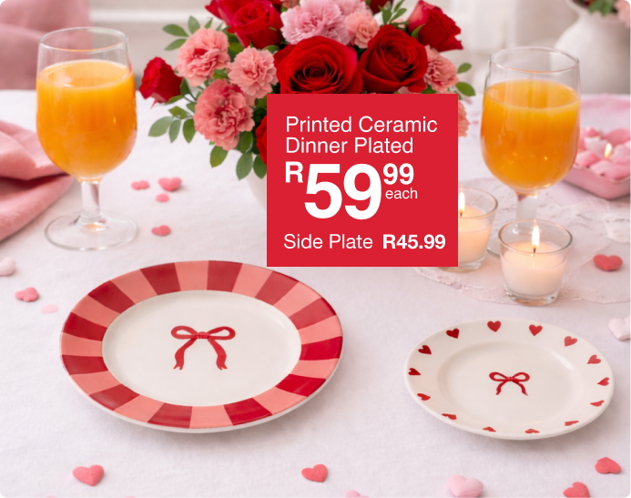 shop romanticise life everyday is a valentines day collection full of red and romantic dinner plates, flowers and valentines day specials, the table setting is of a perfect date night for valentines day