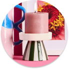 Scented candles and stylish candle holders to create a warm atmosphere