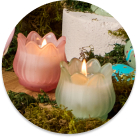 Scented candles and modern candle holders to create a relaxing atmosphere
