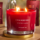 Scented candles and modern candle holders to create a cozy atmosphere